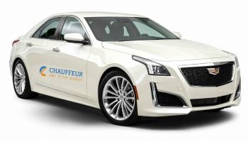 white Cadillac CTS 2026 Chauffeur Car Hire Dubai