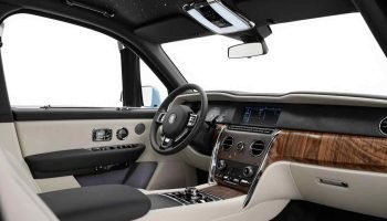 White Rolls Royce Cullinan 2026 front white interior